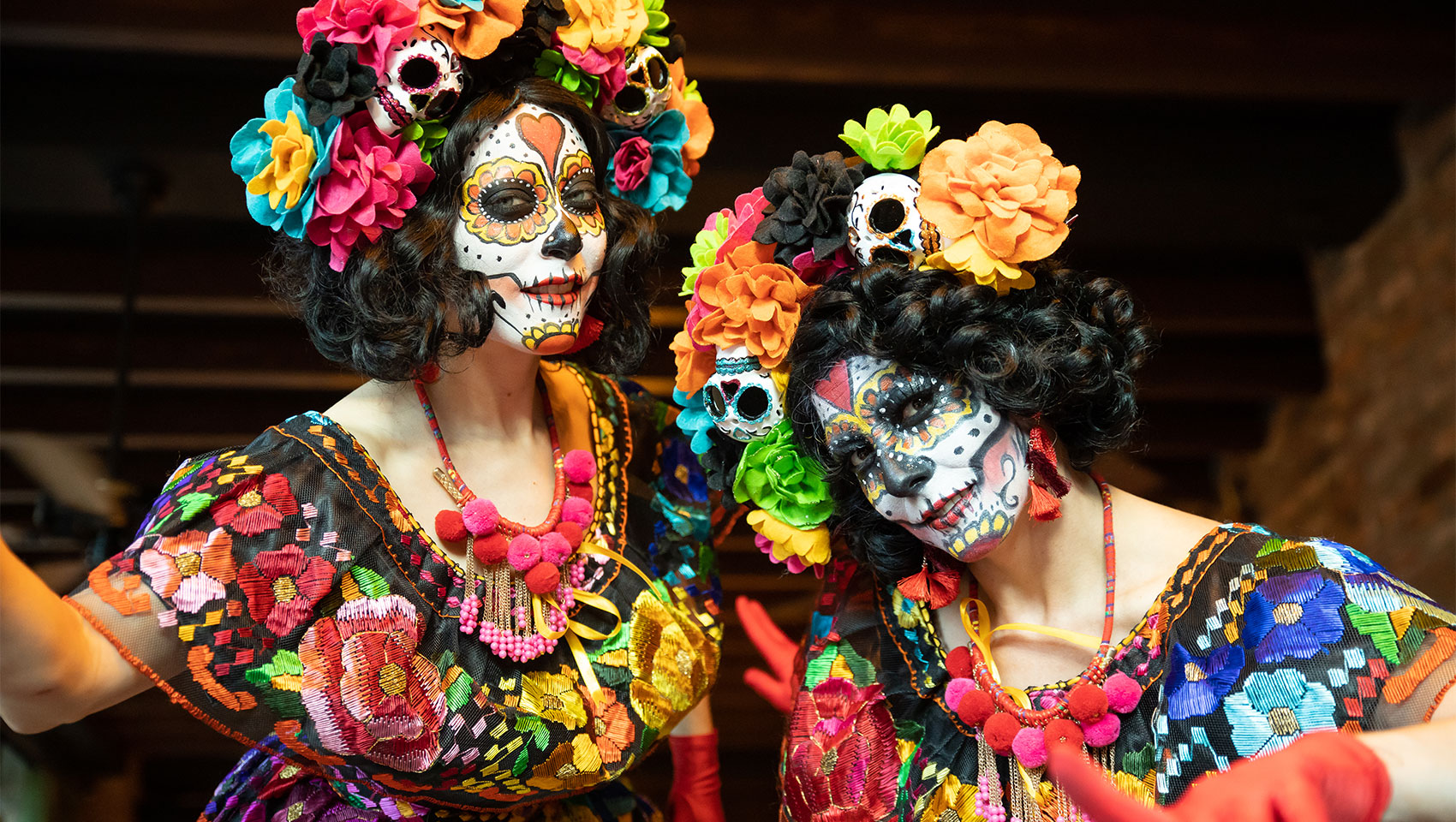 PAtrons dressed for Dia de los Muertos