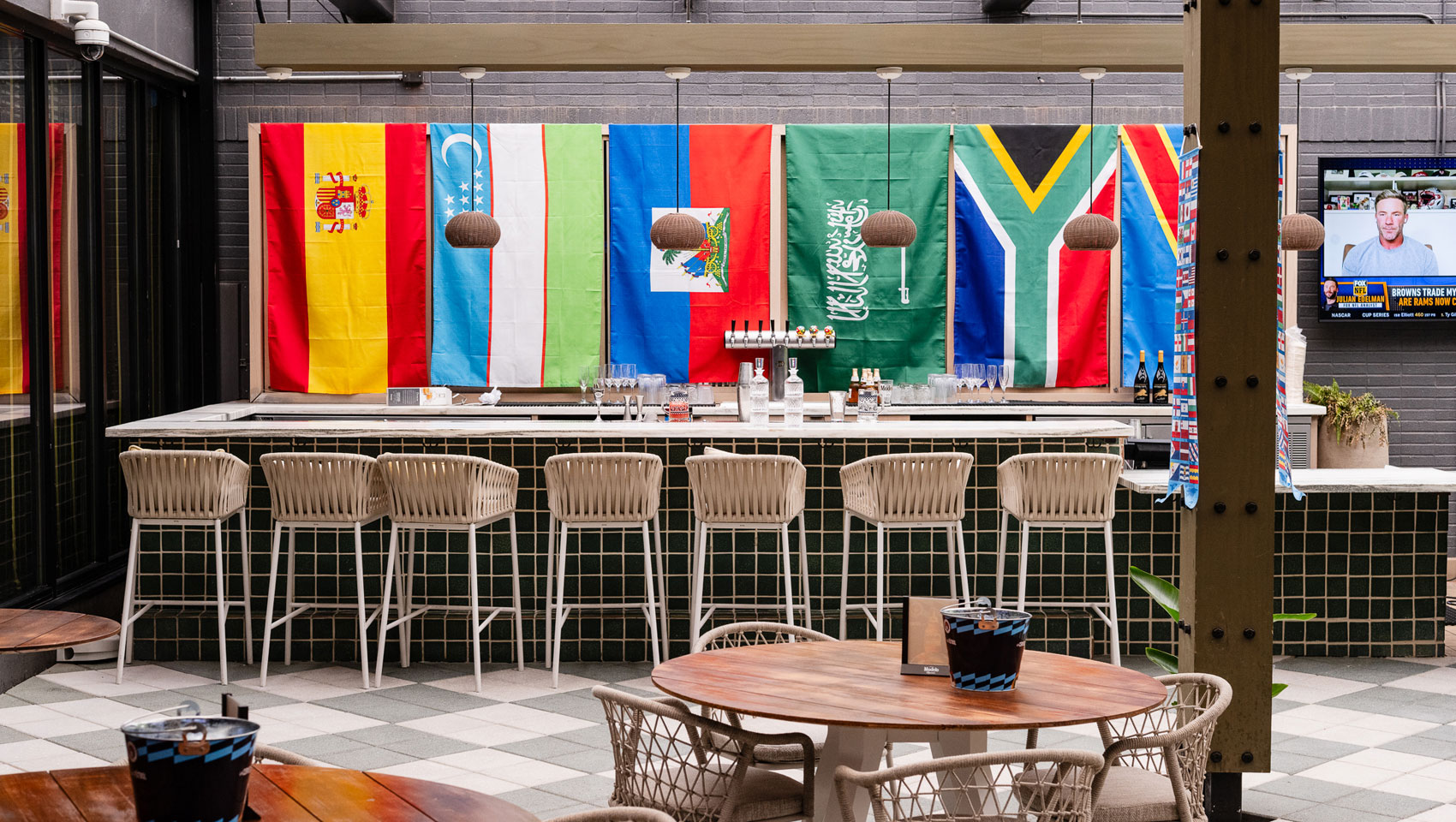 Soccer watch party set-up at Willow Bar at The Betty with different country flags