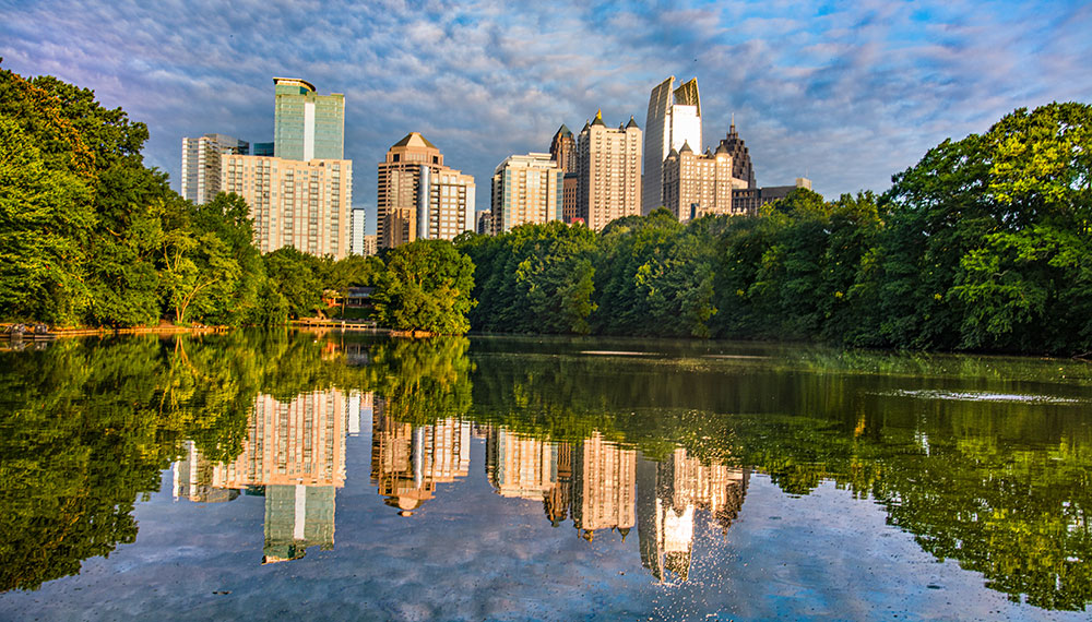 buckhead with midtown buildings and a lake