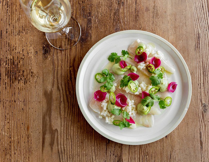 plated salad and wine glass