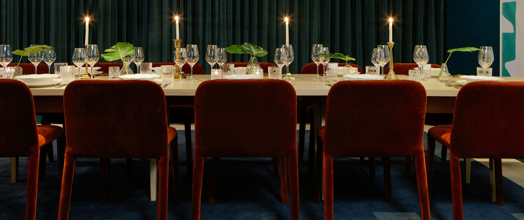 royal table set with lit candles